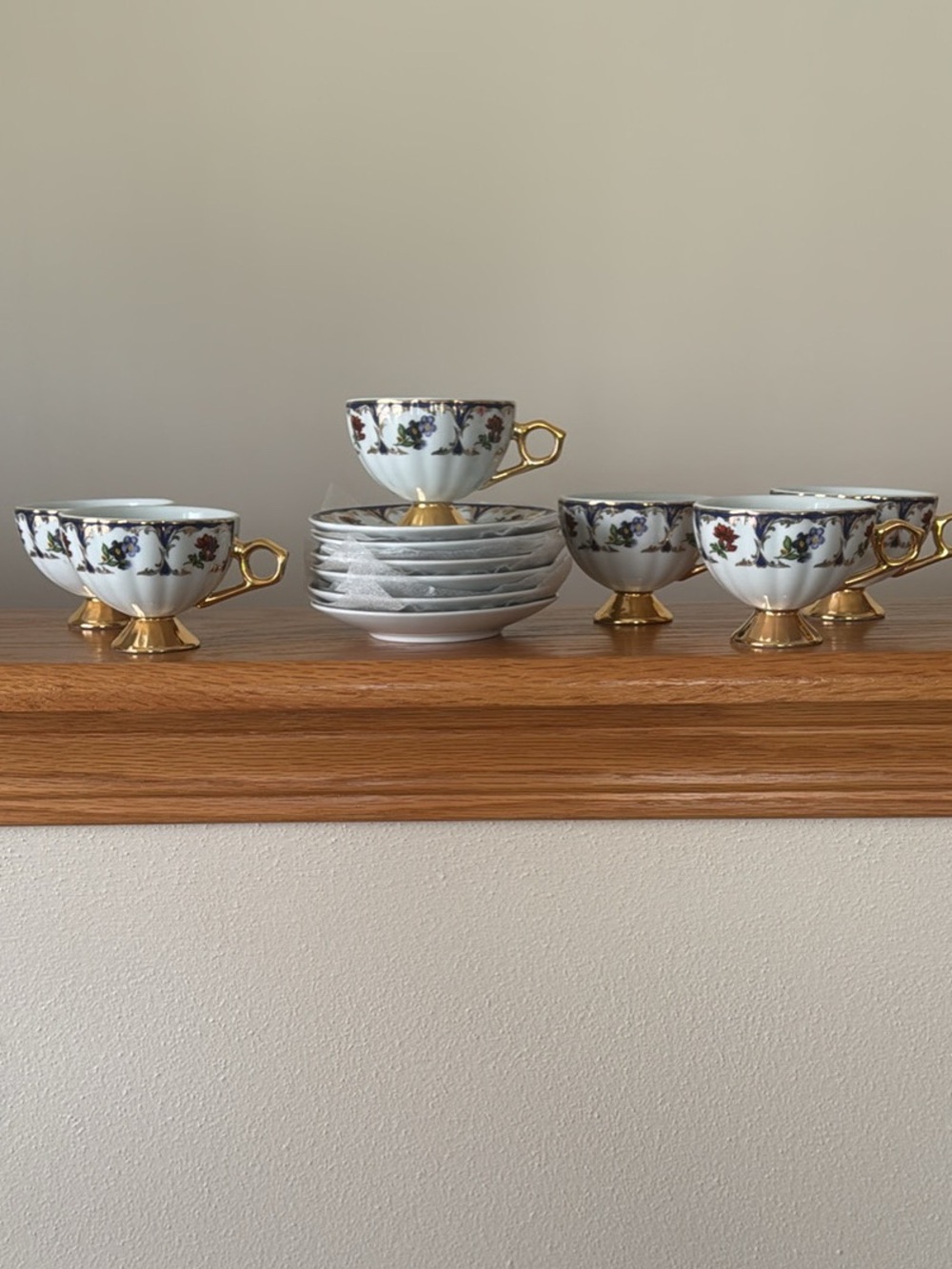 Gold-Accented White Porcelain Tea Cup Set with Floral Trim